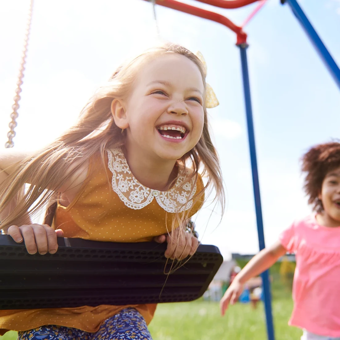 Kids playing on swing set